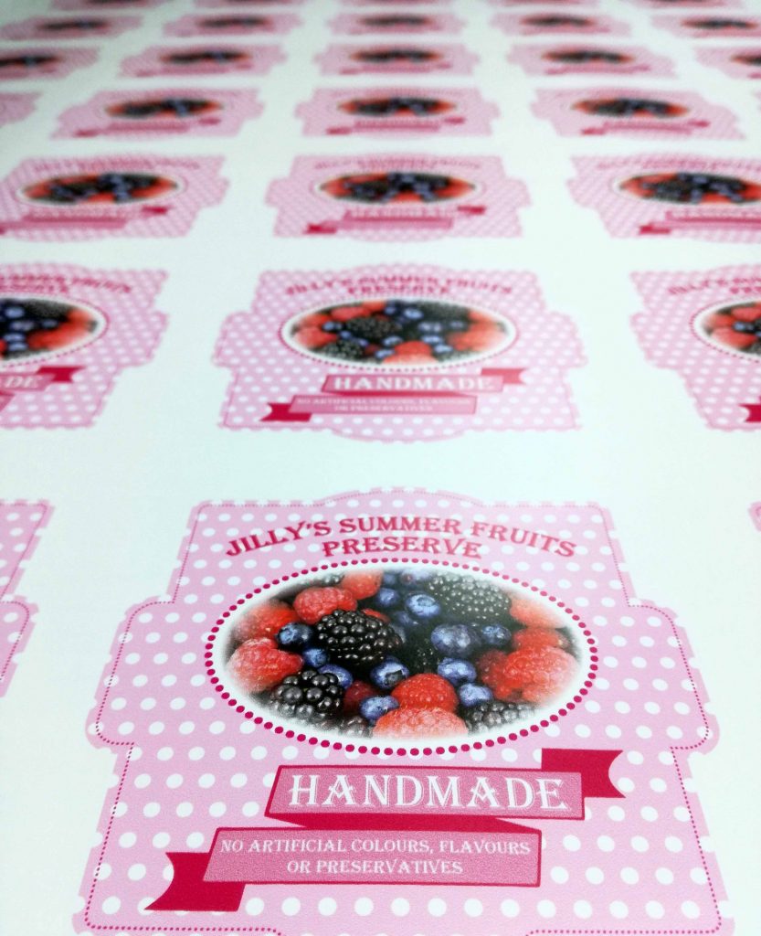 Rows of printed jam labels.