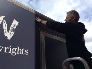 A Wheelwrights sign on a trailer.