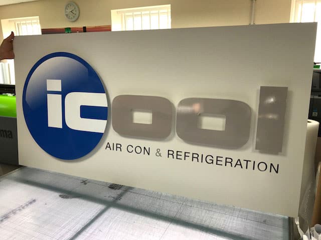 A large sign reading "icool Air Con & Refrigeration."