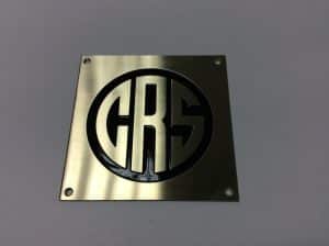 A stainless steel sign with "CR5" in a circle logo.
