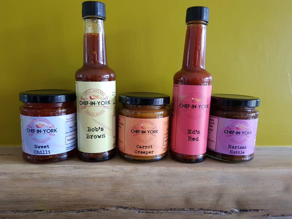 3 jars of savory jam and 2 bottles of sauce.