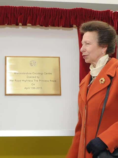 engraved brass plaque at unveiling ceremony